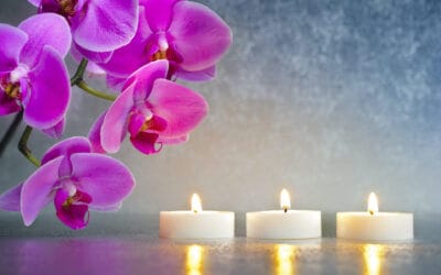 Jardin japonais zen avec des orchidées et des bougies